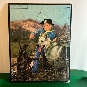 Vintage 1956 Walt Disney Rin Tin Tin Whitman puzzle with plastic cover.